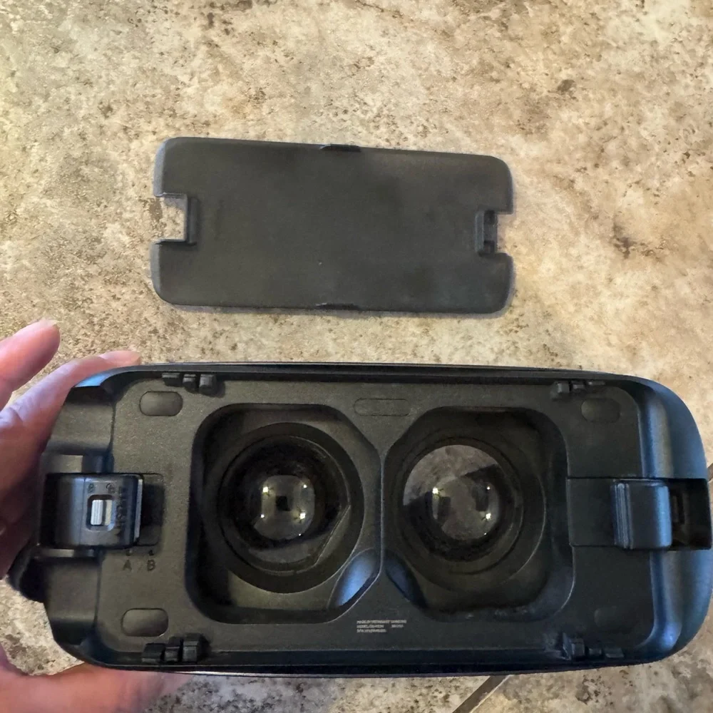 Black VR Headset Samsung Gear VR, a virtual reality headset only. No remote.
